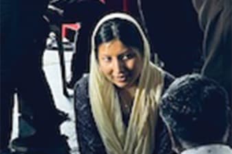 Group Of Hikers Walking In Line On A Footpath In The Mountain, With Copy Space